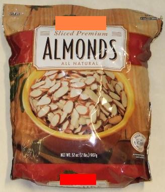 SLICED RAW ALMONDS. WITH SKIN ON. NOT BITTER ALMONDS. PRESENTED IN PRINTED PLASTIC PACKAGING. WEIGHT 907g.