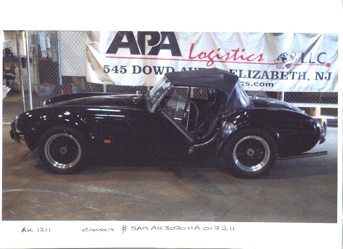 1987 AC COBRA MK IV WITH 302CI SMALL BLOCK FORD PETROL ENGINE. WITH SOFT TOP, TWO DOORS AND A BLACK INTERIOR AND EXTERIOR.