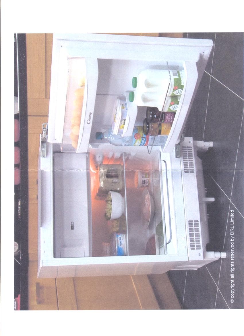 AN UNDER COUNTER REFRIGERATOR WITH A STORAGE CAPACITY OF 117 LITRES. THE REFRIGERATOR IS DESIGNED TO BE BUILT-IN. IT HAS GLASS SHELVES AND DOOR SHELVES. THE DOOR IS REVERSIBLE. WITH AN ADJUSTABLE THERMOSTAT. DIMENSIONS OF THE CAVITY ARE 600 MM WIDE  X 820-870 MM HIGH X 550 MM DEEP. WEIGHT: 33 KG.  COLOUR: WHITE.
