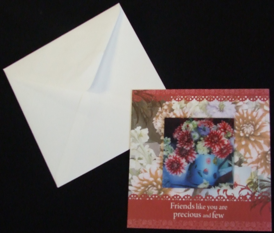 A PRINTED FRIENDSHIP GREETINGS CARD. OF PAPERBOARD. WITH PRINTED FLORAL DESIGN AND HOLOGRAPHIC IMAGE OF FLOWERS IN VASE. WITH ENVELOPE.