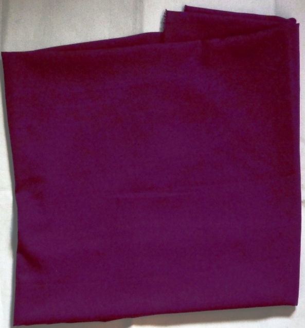 A 100 PERCENT POLYESTER WOVEN DYED FABRIC. WIDTH APPROXIMATELY 150 CM. USED FOR DRAPES, COVERS, LININGS CLOTHING ETC.