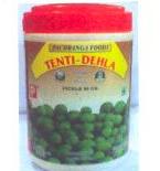 TENTI-DELHA PICKLE CONTAINING TENTI-DELHA (FRUIT), SALT, COTTONSEED OIL, FENNEL, TURMERIC, RED CHILLIES, CUMIN, CORIANDER, MUSTARD POWDER, NIGELLA, AND PRESERVATIVE SODIUM BENOZATE (E211). NO ADDED SUGAR, ACETIC ACID OR VINEGAR. CONTAINED IN AN 800 GRAMMES PLASTIC JAR.