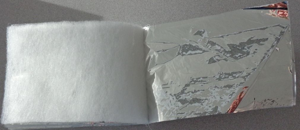 MULTILAYER INSULATION MATERIAL. USED AS THERMAL INSULATION FOR FLOORS, WALLS AND ROOFS IN DOMESTIC BUILDINGS AND BUILDINGS WITH SIMILAR TEMPERATURES. CONSISTING OF 2 X OUTER LAYERS OF ALUMINIUM FOIL 7 MICROMETRES THICK BACKED WITH 100 MICROMETRES OF LDPE (LOW DENSITY POLYETHYLENE), WITH 4 X LAYERS OF POLYESTER FIBRE WADDING 10 MM 70 G/M2, 6 X LAYERS OF EXPANDED PE (POLYETHYLENE) 0.7 MM 23 KG/M3, AND 7 X LAYERS OF METALLISED ALUMINIUM PET (POLYETHYLENE TEREPHTHALATE) 10 MICRO METRES. OVERALL THICKNESS APPROX 40MM.THESE ARE INDIVIDUAL LAYERS HELD TOGETHER WITH STITCHING ALONG THE LENGTH OF THE ROLL, WITH A SMALL PLASTIC TAG PUSHED THROUGH ALL THE LAYERS AT REGULAR INTERVALS (5 PER M2). PRESENTED IN 1.5 X 10M ROLLS WITH A PRINTED PAPER LABEL.