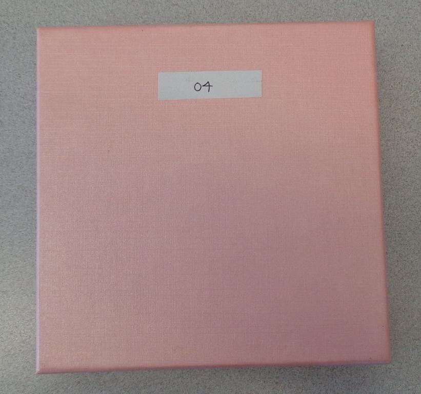 THIS IS A BOX USED TO GIVE AWAY JEWELLERY OR GIFTS FOR PRESENTATION PURPOSES. IT IS PINK IN COLOUR. IT IS MADE OF CARDBOARD. DIMENSIONS ARE 15X15X3.5CMS