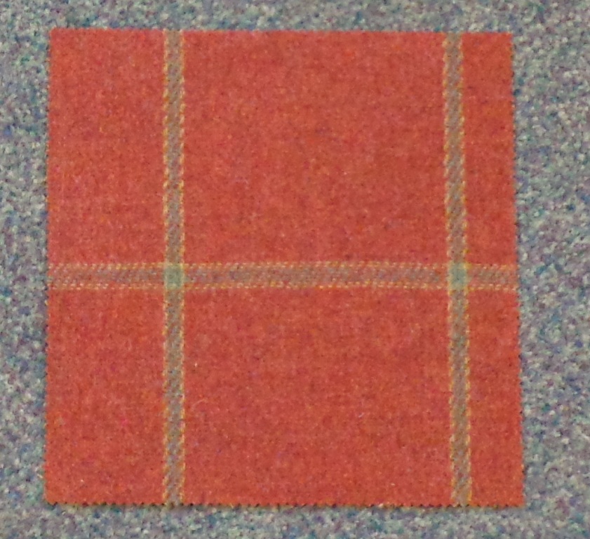 WOVEN FABRIC OF CARDED WOOL. HAVING A WEIGHT OF 290 GRAMS PER METRE SQUARED. WIDTH 138CM.