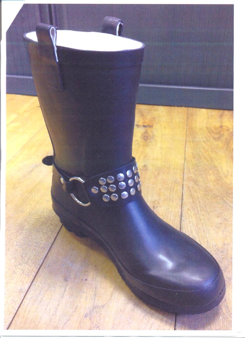 LADIES WELLINGTON BOOT. COVERING THE ANKLE BUT NOT COVERING THE KNEE. WITH UPPERS OF PLASTIC. WITH OUTER SOLE OF RUBBER/PLASTIC. SLIP ON. WITH STUDDED ANKLE STRAP.  BLACK IN COLOUR.