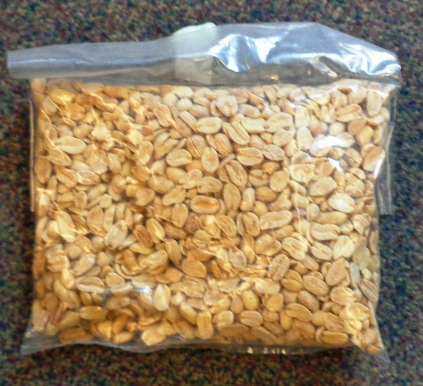 LIGHT ROASTED  BLANCHED SPLIT PEANUTS.  BASIC RAW PEANUTS THAT HAS BEEN SHELLED AND HEAT TREATED TO REMOVE SKIN. THIS PRODUCT PASSES THROUGH THE DRYING OVEN AS PER THE BLANCHED PRODUCT BUT IS SUBJECTED TO AN EXTRA 20 DEGREE OR 30 DEGREE TEMPERATURE TO GIVE IT A BROWNER COLOUR WHICH ENHANCES THE FLAVOUR. THE PRODUCT IS FOR ONWARD PROCESS BY USE INTO FLAKES, CHOPPED, PASTE. THE RAW MATERIAL ARRIVES IN 25KG BULK CARTONS. THESE PRODUCTS ARE PURCHASED FROM ARGENTINA.