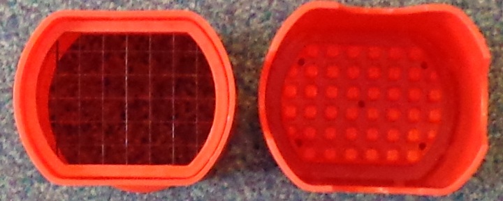 A KITCHEN TOOL FOR CHOPPING POTATOES INTO FRENCH FRIES.  IT IS A PLASTIC PRODUCT MADE OF ABS PLASTIC WITH A STAINLESS STEEL GRID SHAPED CUTTER AT THE BASE.  THE POTATO IS PLACED INTO ONE PART OF THE CARTON AND THE SECOND PIECE CHOPS THE POTATO AS IS COVERS IT TO AVOID THE RISK OF CUTTING THE OPERATOR.