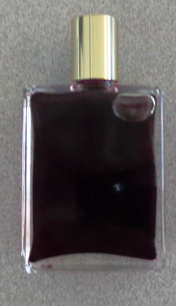 A 50 ML RECTANGULAR SHAPED BOTTLE CONTAINING ALMOND OIL, SUNFLOWER OIL, WATER, HERBS, CRYSTALS, AND COLOURINGS. AS THE OIL AND THE WATER ARE NOT THE SAME WEIGHT, ONE RESTS ON TOP OF THE OTHER WITHIN THE BOTTLE. AS EACH ONE HAS A DIFFERENT COLOURING, IT HAS THE EFFECT OF SHOWING TWO DIFFERENT COLOURS WITHIN THE BOTTLE, ONE ON TOP OF THE OTHER. THERE ARE 111 DIFFERENT COLOUR COMBINATIONS AVAILABLE. THE PURPOSE IS FOR SOMEONE TO SELECT THE FOUR COLOUR COMBINATIONS THEY ARE MOST DRAWN TO WHEREUPON THESE CHOICES ARE DISCUSSED WITH A CONSULTANT TO DISCOVER OR REINFORCE AN INDIVIDUAL'S GIFTS, CHALLENGES AND CHARACTER. THE BOTTLES HAVE A TOP WITH AN OPENING. A QUANTITY IS SHAKEN ONTO THE HAND WHEREUPON A DISTINCTIVE ODOUR CAN BE DISCERNED; THIS CREATES AN AURA ABOUT THE PERSON INTENDED TO REVITALISE, AND CARE FOR THE SOUL.
