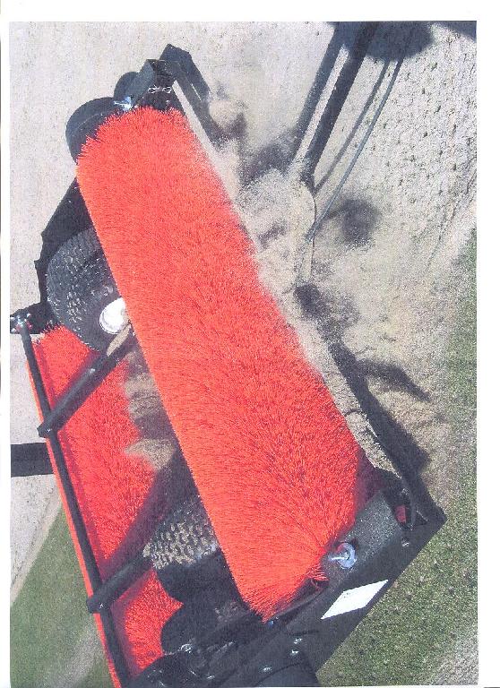PRODUCT IS DESIGNED FOR WORKING TOP DRESSING (SAND / SOIL BLEND) INTO GOLF GREENS TO IMPROVE PLANT HEALTH AND TO MODIFY THE SOIL PROFILE. 

IT HAS DRIVE WHEELS AND A WORKING BRUSH. IT IS HITCHED TO THE BACK OF ANOTHER VEHICLE.

IT IS NOT SUITABLE FOR USE ON ANY SURFACE OTHER THAN NATURAL SPORTS TURF OR MODERN SYNTHETIC TURF.