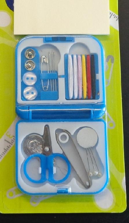 MINI SEWING KIT CONSISTING OF NEEDLES, COTTON, PINS, SAFETY PIN, SCISSORS, BUTTONS, PRESS STUDS, TWEEZERS AND A NEEDLE THREADER. PACKAGED IN A BLISTER PACK WITH CARDBOARD BACKING.