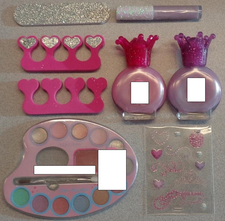 NAIL VARNISH. PACKAGED IN  SMALL BOTTLE WITH CROWN ON THE TOP, PACKAGED WITH THE FOLLOWING: A PLASTIC MAKE UP BAG, ANOTHER NAIL VARNISH, TWO NAIL SEPERATORS,  ONE NAIL FILE AND BODY STICKERS, A LIP GLOSS AND A LIP GLOSS/EYE SHADOW PALETTE (ALL CLASSIFIED SEPERATELY).
