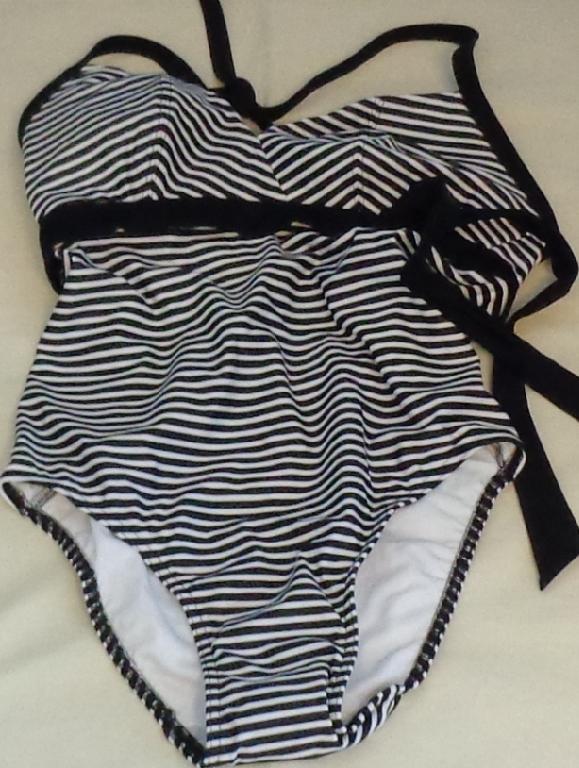BLACK AND WHITE STRIPE LADIES SWIMSUIT. A ONE PIECE SWIMMING COSTUME FOR WOMEN. WITH  HALTER STYLE NECK STRAP, AND CLASP AT UPPER BACK. WITH PADDED SHAPED CUPS. WITH INNER LINING TO BODY AND ADDITIONAL LINING AT CROTCH. 80%  NYLON 20% LYCRA.