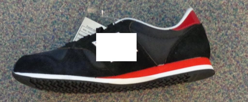 UNISEX FOOTWEAR IN BLACK WITH RED LOGO AND PANEL AT REAR. WITH UPPERS OF SUEDE AND TEXTILE. THE SUEDE PREDOMINATES AND IS THE VIABLE UPPER. NOT COVERING THE ANKLE. OUTER SOLE OF RUBBER - INNER SOLE LENGTH EXCEEDING 24CM. LACE-UP FASTENING. BRAND LOGO ON BOTH SIDES. PUT UP FOR RETAIL SALE AS UNISEX.