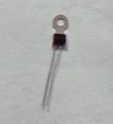 A CERAMIC POSITIVE TEMPERATURE COEFFICIENT THERMISTOR WITH A POWER HANDLING CAPACITY OF 3 WATTS.  THE THERMISTOR IS OF A SMALL SIZE, WITH A TOTAL LENGTH OF 4.5 CM.  IT HAS VERY FAST REACTION TIME AND OFFERS A WIDE RANGE OF PROTECTION TEMPERATURE. 0 - +40 DEGREE C (V=VMAX), 0 - Ta +25 DEGREE C (V=0).  THE THERMISTOR IS SUITABLE FOR USE IN ELECTRICAL MACHINERY, TRANSFORMER.