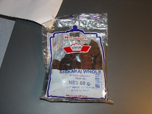 A DRIED ACACIA CONCINNA (DRIED HERB)  IN POD FORM. PACKAGED IN A 50g NET PACKET.
