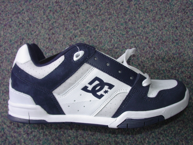UNISEX TRAINING SHOE. NOT COVERING THE ANKLE. UPPERS OF LEATHER AND PLASTIC MATERIAL. LEATHER PREDOMINATES. OUTER SOLES OF RUBBER. WITH LOGO ON HEEL, UPPER AND TONGUE. LACE UPS. INSOLE LENGTH EXCEEDING 24 CMS. NO VISIBLE EVIDENCE OF ANY SPECIAL TECHNOLOGY FEATURES IN SOLE. BLUE/WHITE IN COLOUR.