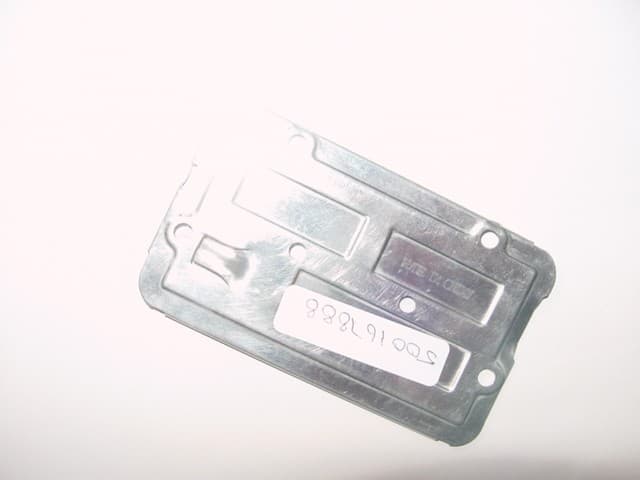 A FITTING FOR A FILE CONSISTING OF A RECTANGULAR METAL BACKPLATE. THE PLATE HAS RADIUS CORNERS ELECTROPLATED WITH NICKEL FINISH. THE PLATE CONTAINS HOLES FOR INSERTING RIVETS, USED TO SECURE THE PLATE. THE SIDES ARE TURNED IN FORMING A C SHAPE TO SECURE THE LEVER ARCH MECHANISM TO THE PLATE.