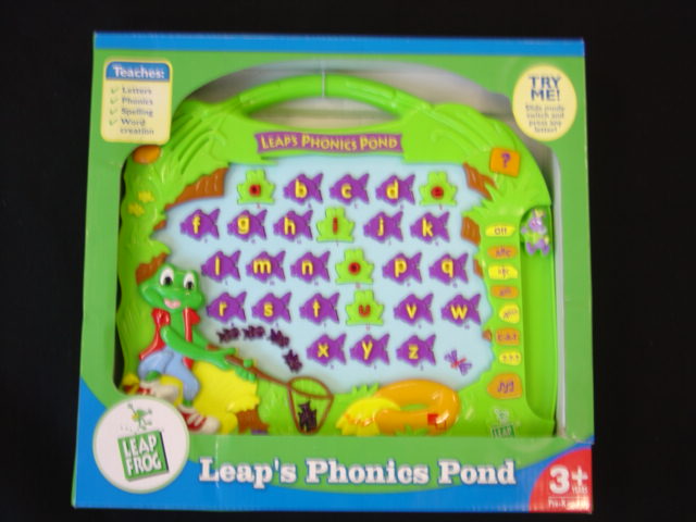 LEARNING SYSTEM.  INCLUDES SIX GAMES CHALLENGING CHILDREN TO FIND LETTERS, HEAR THEIR PHONECTIC SHOUNDS AND CREAT/SPELL WORDS.  FISH SYMBOLS LIGHT UP TO REWARD CORRECT ANSWERS AND MUSIC PLAYS TO ADD TO THE FUN.  MADE OF PLASTIC PACKED IN A CARDBOARD BOX