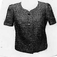 LADIES WOVEN COLLARLESS JACKET OF 51 PERCENT VISCOSE 49 PERCENT POLYESTER. DESIGNED TO COVER THE UPPER BODY FROM THE SHOULDER TO THE HIP.WITH ROUND NECK. WITH FULL OPENING. WITH RIGHT OVER LEFT  BUTTON FASTENING. WITH HEM FINISHES. WITH SHORT SLEEVES. FULL ACETATE LINING. GARMENT LENGTH IS 56.1 CM.