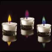 TEALIGHT CANDLES WHICH BURN WITH A COLOURED FLAME.  MADE FROM TRIMETHYL CITRATE - WHICH IS AN ESTER OF CITRIC ACID - A FOOD PRESERVATIVE.  THE CRYSTALS ARE MELTED IN VATS AND POURED BY HAND, NO MECHANISATION.  THE FLAME FROM THESE CANDLES IS SOFT AND FUZZY AND THEREFORE CAN NOT BE USED TO LIGHT A ROOM.  THE CANDLES ARE AVAILABLE WITH A RED, GREEN, ORANGE, BLUE, PURPLE OR PINK FLAME.  PACKAGED FOR RETAIL SALE IN QUALITY CARDBOARD BOXES WITH SEPARATE PLASTIC INNERS.  BURN TIME: 1 HOUR.