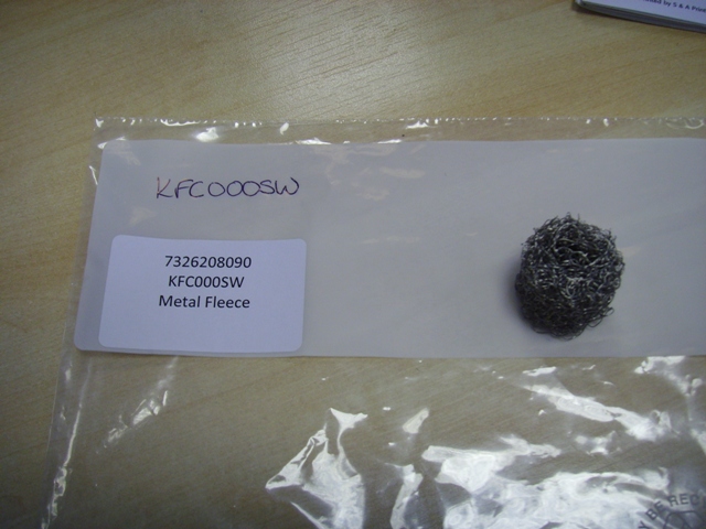 A KETTLE FUR COLLECTOR MADE OF STAINLESS STEEL WIRE IN A CIRCULAR ROD SHAPE. ITEM TO BE PLACED IN THE KETTLE WHERE IT ATTRACTS THE CALCIUM DEPOSITS SO KEEPING THE KETTLE CLEANER AND SCALE FREE.
