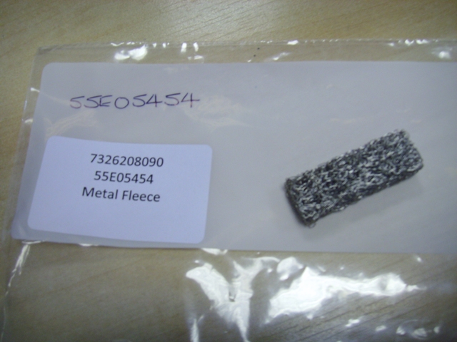 A KETTLE FUR COLLECTOR MADE OF STAINLESS STEEL WIRE IN A RECTANGULAR BLOCK SHAPE. ITEM TO BE PLACED IN THE KETTLE WHERE IT ATTRACTS THE CALCIUM DEPOSITS SO KEEPING THE KETTLE CLEANER AND SCALE FREE.