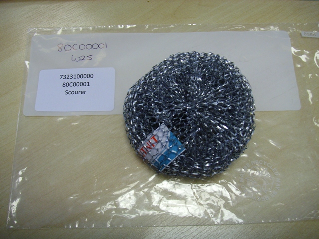 A PAN SCOURING PAD OF GALVANISED STEEL WOOL.