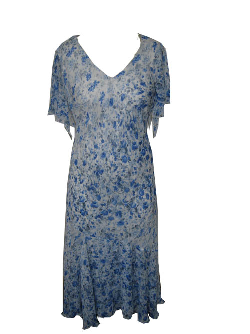 WOVEN DRESS FOR WOMEN.  CUT ON BIAS.  REACHING DOWN TO BELOW THE KNEE.  ACETATE LINING.  V NECK WITHOUT OPENING.  SHORT SLEEVES.  OVERLOCKED AT SLEEVE ENDS AND AT BASE. OF VISCOSE