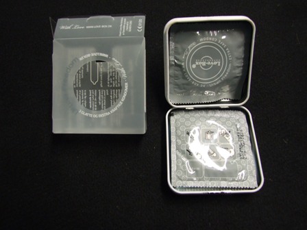 MALE CONDOMS, SHEATHS MADE FROM NATURAL LATEX RUBBER. THESE ARE LUBRICATED CONDOMS. PACKAGED FOR RETAIL SALE AS A SET OF THREE INDIVIDUALLY WRAPPED CONDOMS, IN A SQUARE METAL CONTAINER IN AN OUTER PLASTIC PRINTED SLEEVE.  ALSO CONTAINS AN INSTRUCTION LEAFLET.