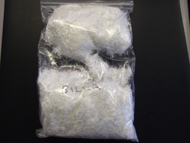 FIBREGLASS STRANDS FOR USE IN CATALYTIC CONVERTER WRAPS. COMPRISING OF SILICA  96 PER CENT, ALUMINA OXIDE 1.5 PER CENT, MOISTURE 2 PER CENT.