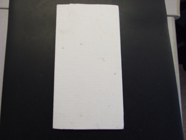 MINERAL WOOL IN SHEET FORM USED IN CATALYTIC CONVERTER WRAPS. COMPRISING OF ALUMINA (111) OXIDE 75.5-76.7 PER CENT, SILICA 18-19 PER CENT, ORGANIC BINDER 5.5 PER CENT.