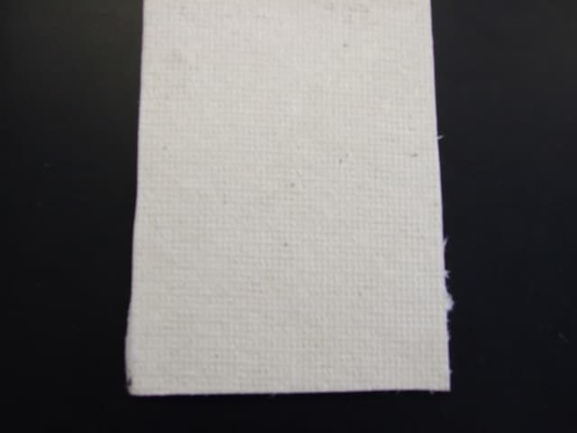 NON WOVEN BOARD COMPRISING OF 1.4 PER CENT OF ALUMINA, 91 PER CENT OF SILICA, 5.5 PER CENT ORGANIC BINDER, 2 PER CENT MOISTURE. USED FOR CATALYTIC CONVERTER WRAPS