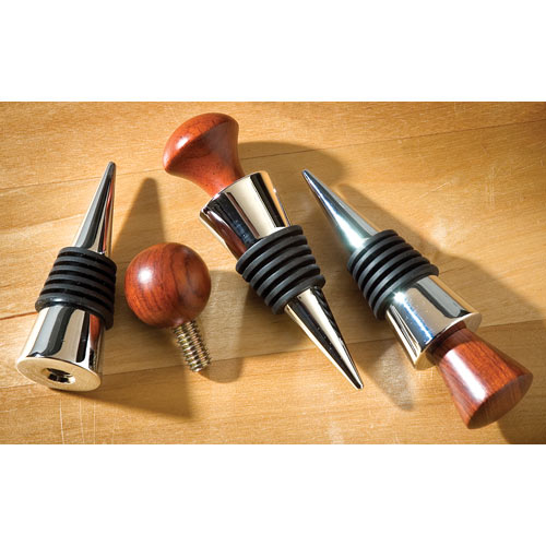 A BOTTLE STOP (CRAFT KIT, METAL CORK) MADE OF BASE METAL , HOLDING A SMALL RUBBER BUNGE,AND ONE SCREW, CHROME PLATED. ONE UNIT PER CARDBOARD BOX. THE PURPOSE, TO PERSERVE WINE IN A WINE BOTTLE.