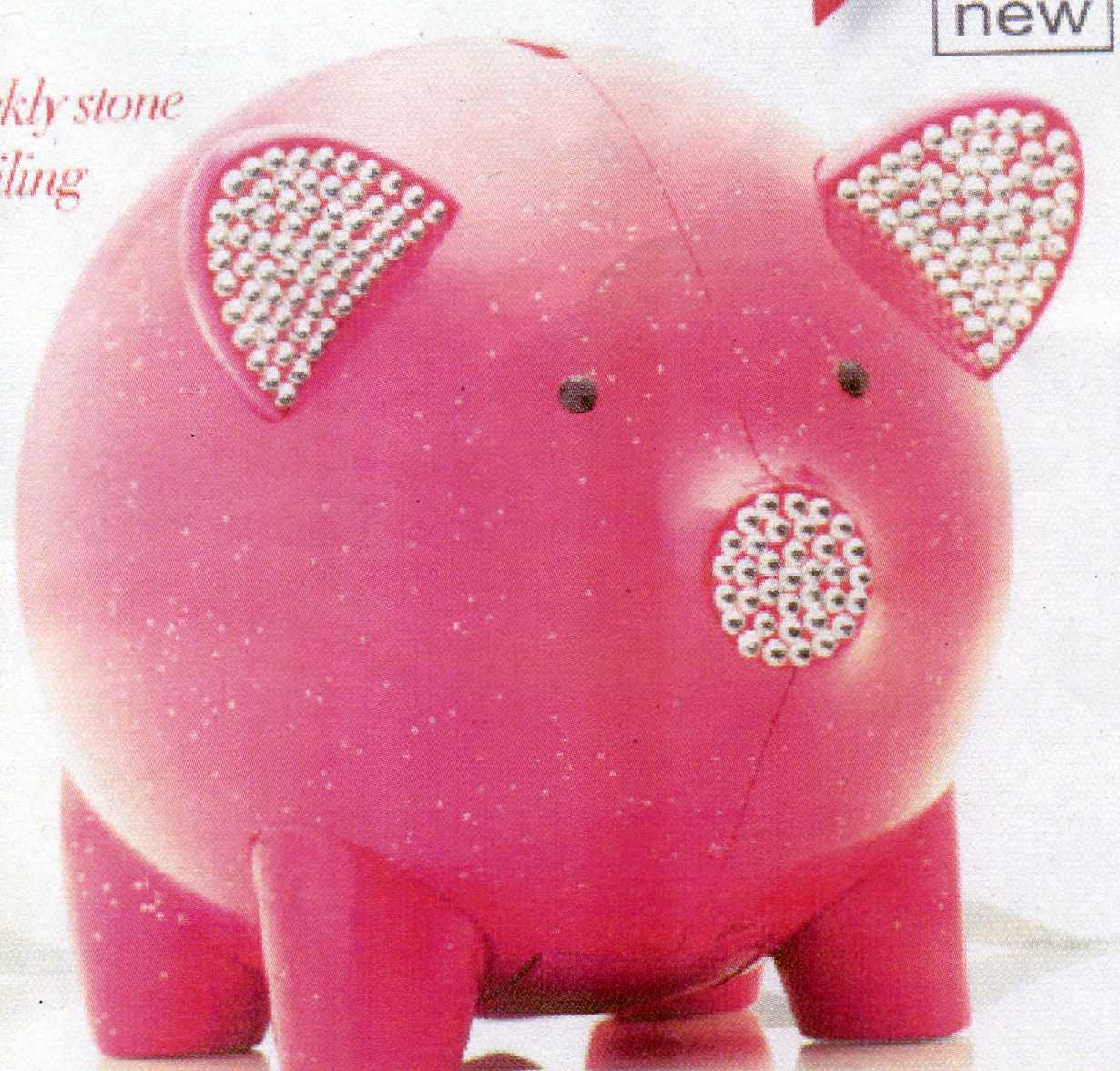 PLASTIC PIG-  SHAPED COINS COUNTER WITH LCD DISPLAY. DIAMANTE STYLE STONES ON THE EARS, NOSE AND EYES FOR ADDED SPARKLE. APPROXIMATE SIZE IS 17CM X 12.5 X 12. REQUIRES 2 X AA BATTERIES WHICH ARE NOT INCLUDED.