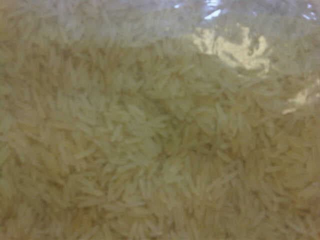 WHITE BASMATI RICE FOR HUMAN CONSUMPTION.  WHOLLY MILLED AND PARBOILED.  MEAN LENGTH = 8.62 MM.  MEAN WIDTH = 1.95 MM.  LENGTH/WIDTH RATIO > 3.  SUPPLIED IN BAGS CONTAINING 5 KG (BAGS MEASURE: 30 X 46 CM).