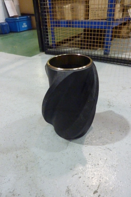 DRILL PIPE GUIDE OF  HIGH TEMPERATURE MOULDED POLYMER (BOS21 OR BOS22) AND METAL (ST-52 MILD STEEL) RINGS INSERTED INTO EACH END, WHICH ARE COATED WITH YELLOW ZINC CHROMATE FOR SURFACE PROTECTION. THE ITEM IS TO ENSURE CLEARANCE BETWEEN THE PIPE (CASING) AND THE WELL BORE HOLE DURING THE BORING PROCESS. THE PRODUCT CENTRALISES THE POSITIONS OF THE CASING WHICH ALLOWS A BETTER CEMENT JOB TO BE DONE DOWN THE HOLE. THE POLYMER MATERIAL PROVIDES LESS RESISTANCE AS PART OF THE BORING (ROTATING) PROCESS TO GO DOWN INTO TRICKY WELL BORE CONDITIONS, ALLOWING DOWN HOLE (BORING) EQUIPMENT TO BE DEPLOYED (SUNK) WITH GREATER EASE, TO GREATER DEPTHS. THE PRODUCT IS CEMENTED IN PLACE DOWN HOLE AND THEREFORE CANNOT BE RECOVERED TO SURFACE FOR USE AGAIN.