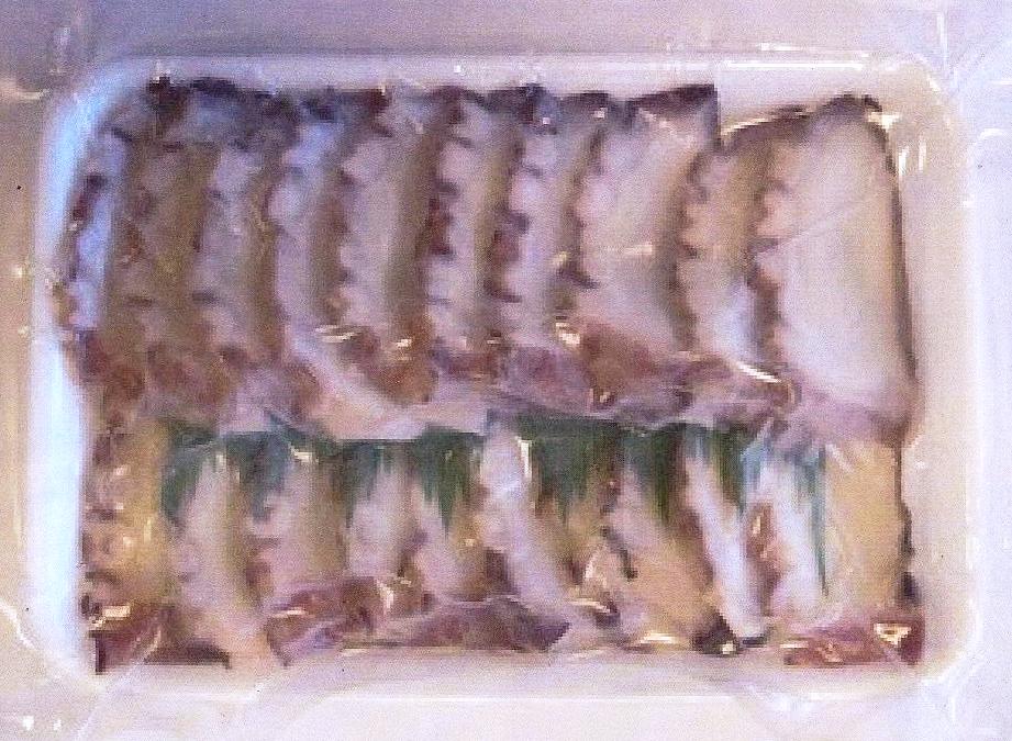 FROZEN, BOILED AND SLICED OCTOPUS. WITH SALT. PACKAGED IN AN AIRTIGHT TRAY/CONTAINER.