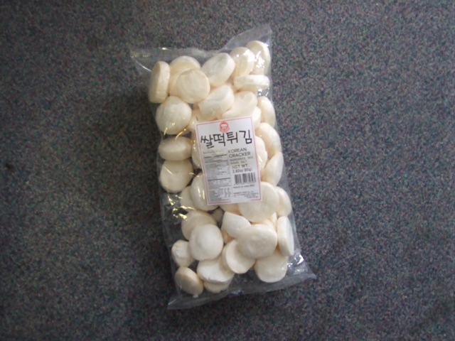 RICE CRACKERS (SSALDDUK TUIGIM) WHICH CONTAIN RICE, SODIUM, SUGAR. EXPANDED ROUND DISKS  READY FOR CONSUMPTION.MADE FROM RICE FLOUR.  PACKAGED FOR RETAIL SALE IN A NET WEIGHT OF 2.82 OZ (80G).