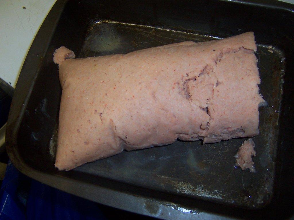 MINCED LOBSTER MEAT, BEING THE MATERIAL WITHIN THE BODY CARCASS. NO OTHER INGREDIENTS HAVE BEEN ADDED. THE PRODUCT IS COOKED BY IMMERSING IT IN BOILING WATER UNTIL AN INTERNAL TEMPERATURE OF 82 DEGREES CENTIGRADE IS REACHED. IT IS THEN KEPT IN THE WATER AT THIS TEMPERATURE FOR THREE SECONDS. THIS PROCESS COAGULATES THE MEAT PROTEIN, AND CHANGES IT FROM BEING TRANSLUCENT TO BEING OPAQUE. ADDITIONALLY THE PROCESS CONTROLS LISTERIA. SUBSEQUENT TO COOKING THE TAIL AND CLAWS ARE SEPARATED AND THE REMAINDER IS MINCED.