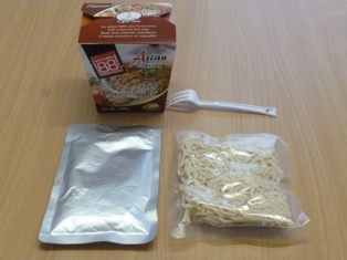 COOKED NOODLES WITH A FLAVOURED SAUCE. THE NOODLES AND SAUCE ARE PACKAGED IN SEPARATE POUCHES WITHIN A CARDBOARD PRESENTATION BOX.  NOODLE INGREDIENTS: WHEAT FLOUR, WATER, WHEAT GLUTEN, MODIFIED TAPIOCA STARCH, RICE BRAN OIL AND SALT. SAUCE INGREDIENTS: WATER, COCONUT EXTRACT, CHICKEN (LESS 20%), CARROT, PEANUT, SUGAR, PEAS, FISH SAUCE, SOYBEAN OIL, GARLIC, TAMARIND EXTRACT, LEMONGRASS, GALANGAL, SPICES, SHALLOT, SALT, CHILLI AND SHRIMP PASTE.