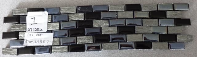 DECORATIVE MOSAIC TILES MEASURING 24MM X 11CM RECTANGULAR.OF 63% GLAZED PORCELAIN AND 37% SLATE ON A PLASTIC BACKING.
