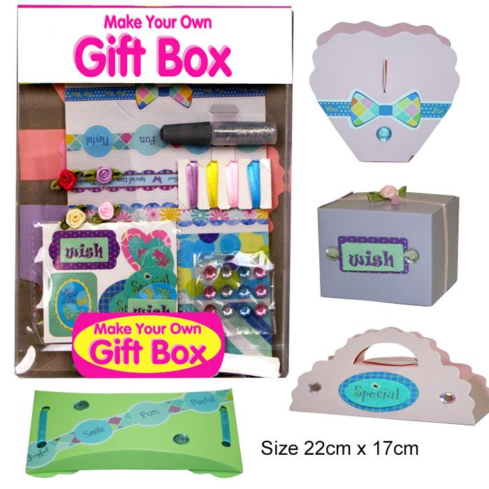 A PAPERBOARD FOLDING GIFT BOX. PRESENTED IN A MAKE YOUR OWN SET WITH 3 OTHER BOXES, EACH OF A DIFFERENT DESIGN. THE SET CONTAINS RIBBON, SMALL FABRIC FLOWER DECORATIONS, PAPER STICKERS, STICK ON PLASTIC JEWELS AND GLITTER GLUE TO DECORATE THE THE 4 DIFFERENT SHAPED FLAT FOLDED GIFT BOXES. ALL PACKAGED TOGETHER FOR RETAIL SALE IN PRINTED PACKAGING. THE ESSENTIAL CHARACTER OF THE SET IS GIVEN BY THE FINISHED FOLDING GIFT BOXES.