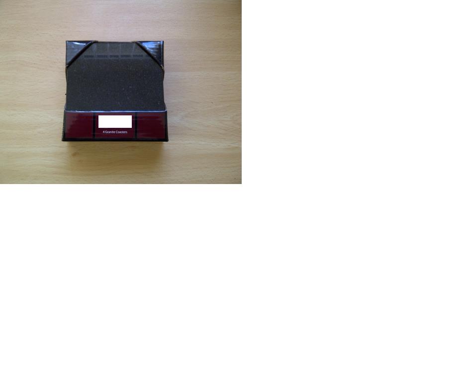 4 BLACK POLISHED GRANITE COASTERS SQUARE SHAPED. MEASURING 10 X 10 CM AND 0.8CM DEEP. PUT UP FOR RETAIL SALE IN PRINTED CARDBOARD PACKAGING .