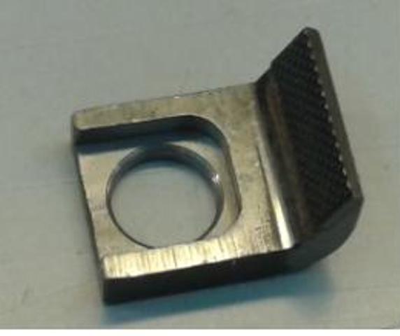A STAINLESS STEEL GRIPPER. NOT A PART FOR GENERAL USE. DESIGNED TO BE USED AS PART OF A PRINTING PRESS.