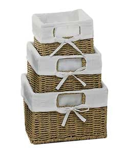 A SET OF THREE LINED NATURAL  SEAGRASS STORAGE BASKETS. THE BASKETS ARE OPEN AT THE TOP AND ARE DESIGNED FOR GENERAL STORAGE. THEY HAVE AN IRON WIRE FRAME AT THE CORNERS AND AROUND THE EDGE.THE LARGEST BASKET MEASURES 33CMS(H) )X 26CMS(W) X 17CMS(D). MEDIUM BASKET MEASURES 29CMS(H) x 22CMS(W) X15CMS(D) AND SMALL BASKET MEASURES 25CMS(H) x 18CMS(W) X 13CMS(D)
