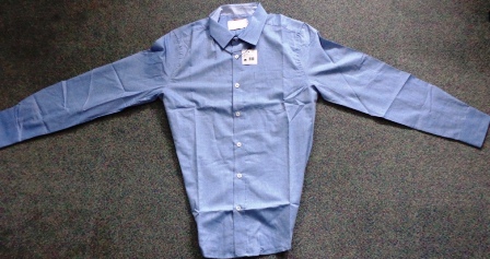 WOVEN SHIRT FOR MEN.  ROUND NECK WITH COLLAR. COMPLETE FRONT OPENING FASTENED LEFT OVER RIGHT BY BUTTONS. WITH POCKET ON LEFT CHEST. LONG SLEEVES WITH BUTTON CUFFS. WITH CURVED, HEMMED BASE.   100% COTTON