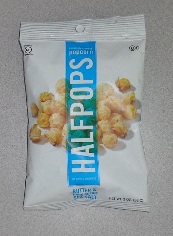 HALF POPPED POPCORN. INGREDIENTS 75% POPCORN, 13.1% CANOLA OIL, 2.3% SEA SALT, 9.5% BUTTER. SOLD AS 18 X 56 GRAMS PACKS.