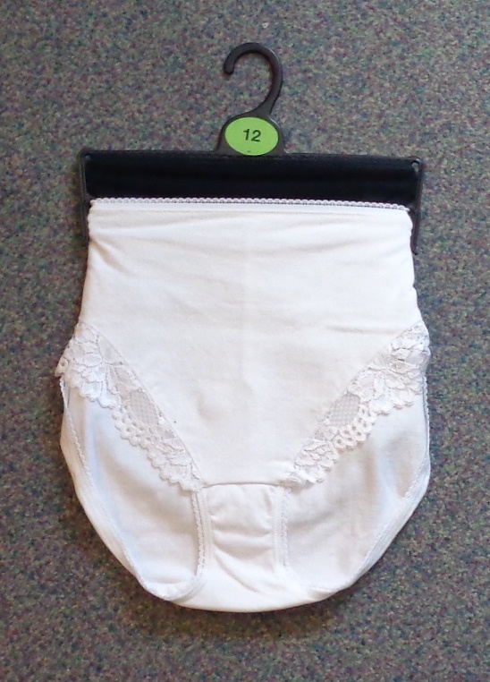 KNITTED LADIES  HIGH LEG LACE TRIM  BRIEFS.  WITH SIDE SEAM OF JUST OVER 7 CM, WITH FRILL AROUND THE WAISTBAND AND REAR OF LEG, WITH LACE AROUND FRONT OF LEG.  A SEAM ON BACK FROM WAIST BAND TO REAR OF GUSSET. MADE OF 79% COTTON AND 12% ELASTANE AND 9% POLYAMIDE, WITH INSERTED GUSSET OF 100% COTTON. EXCLUSIVE OF TRIMMINGS. PACKAGED WITH ANOTHER PAIR OF BRIEFS.  WITH PRINTED CARD FOR RETAIL SALE.