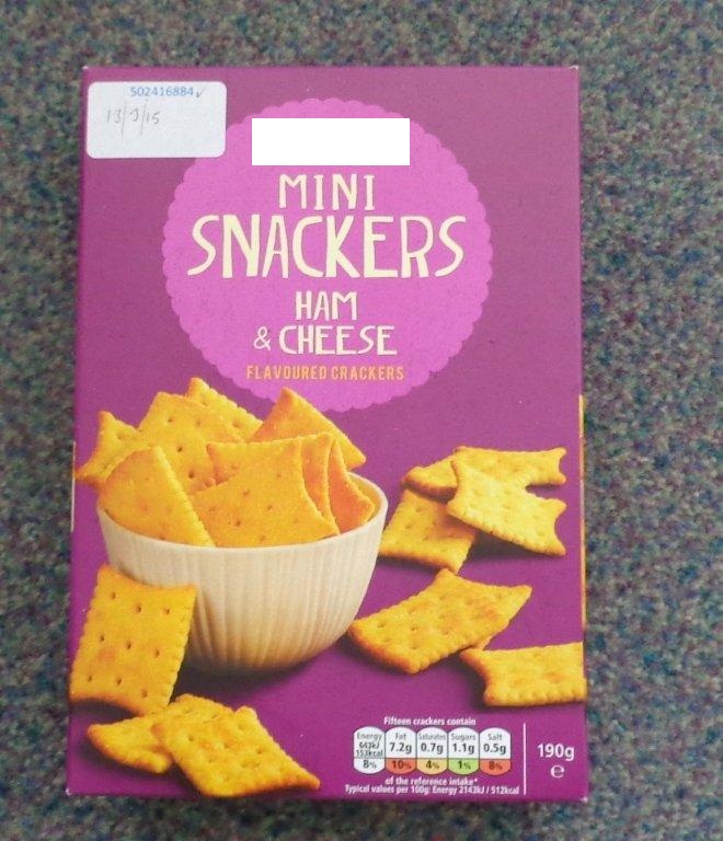 A 190G PACK OF CHEESE AND HAM FLAVOURED CRACKERS. INGREDIENTS; WHEAT FLOUR (WHEAT FLOUR, NIACIN, IRON, THIAMIN, RIBOFLAVIN, FOLIC ACID), SUNFLOWER OIL, SEMOLINA (WHEAT), HAM AND CHEESE SEASONING, CORN STARCH, YEAST AUTOLYSATE, BARLEY MALT EXTRACT, RED PEPPER FLAKES, LEAVENING AGENT (CALCIUM PHOSPHATE), RAISING AGENTS (SODIUM BICARBONATE, AMMONIUM BICARBONATE). CHEESE AND HAM SEASONING CONTAINS: DEXTROSE, SALT, CHEDDAR CHEESE (MILK), SUNFLOWER OIL, YEAST EXTRACT, WHEY POWDER (MILK), FLAVOURING, BUTTERMILK POWDER (MILK), TORULA YEAST, FLAVOURING (MILK), EMULSIFIER (DISODIUM PHOSPHATE), LACTIC ACID, ACIDITY REGULATOR (CALCIUM LACTATE), TURMERIC EXTRACT, PAPRIKA EXTRACT. PACKED IN A FOIL INNER BAG WITHIN A PRINTED CARDBOARD BOX.